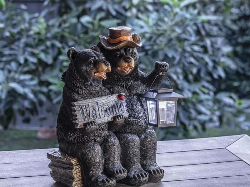Alpine Corporation 15" Tall Outdoor Bear Couple with Lantern and Welcome Sign Statue with Solar LED Light Yard Art Decoration